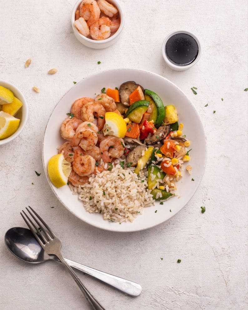 Wok de langostinos con vegetales